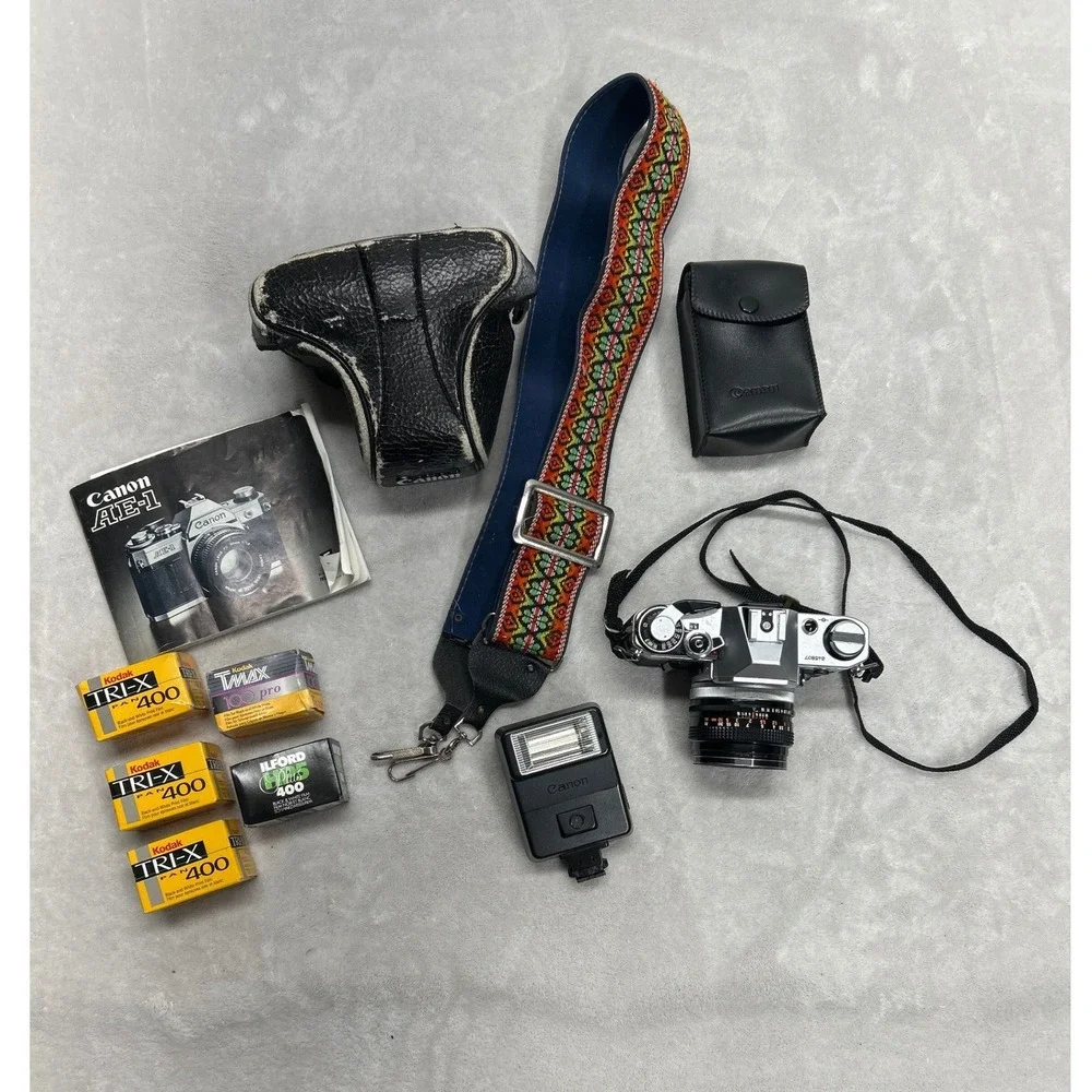 Canon AE-1 Film Camera SLR 35mm 50mm Lens Flash Case Manual Film Lot Untested